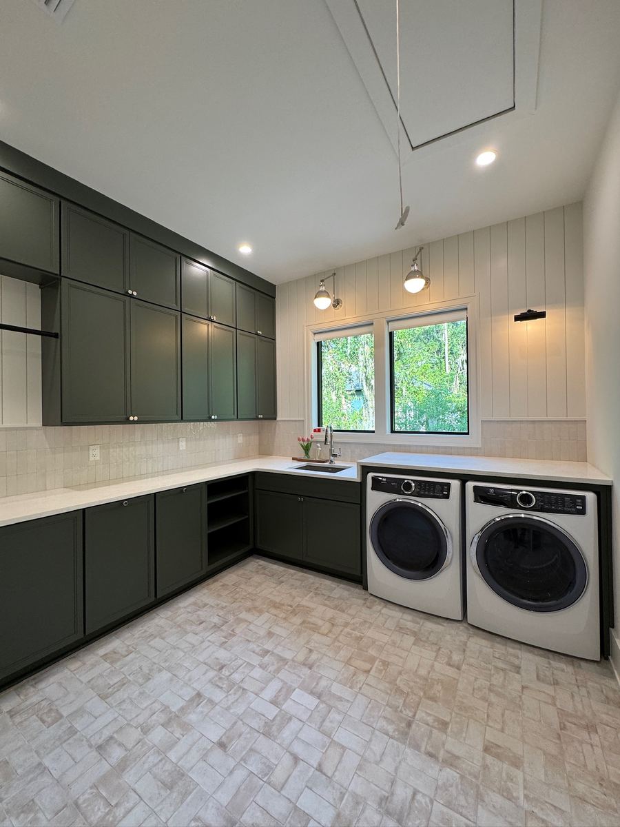 Laundry room remodel with basketweave stone floor tile and zellige-look backsplash, Clay County FL