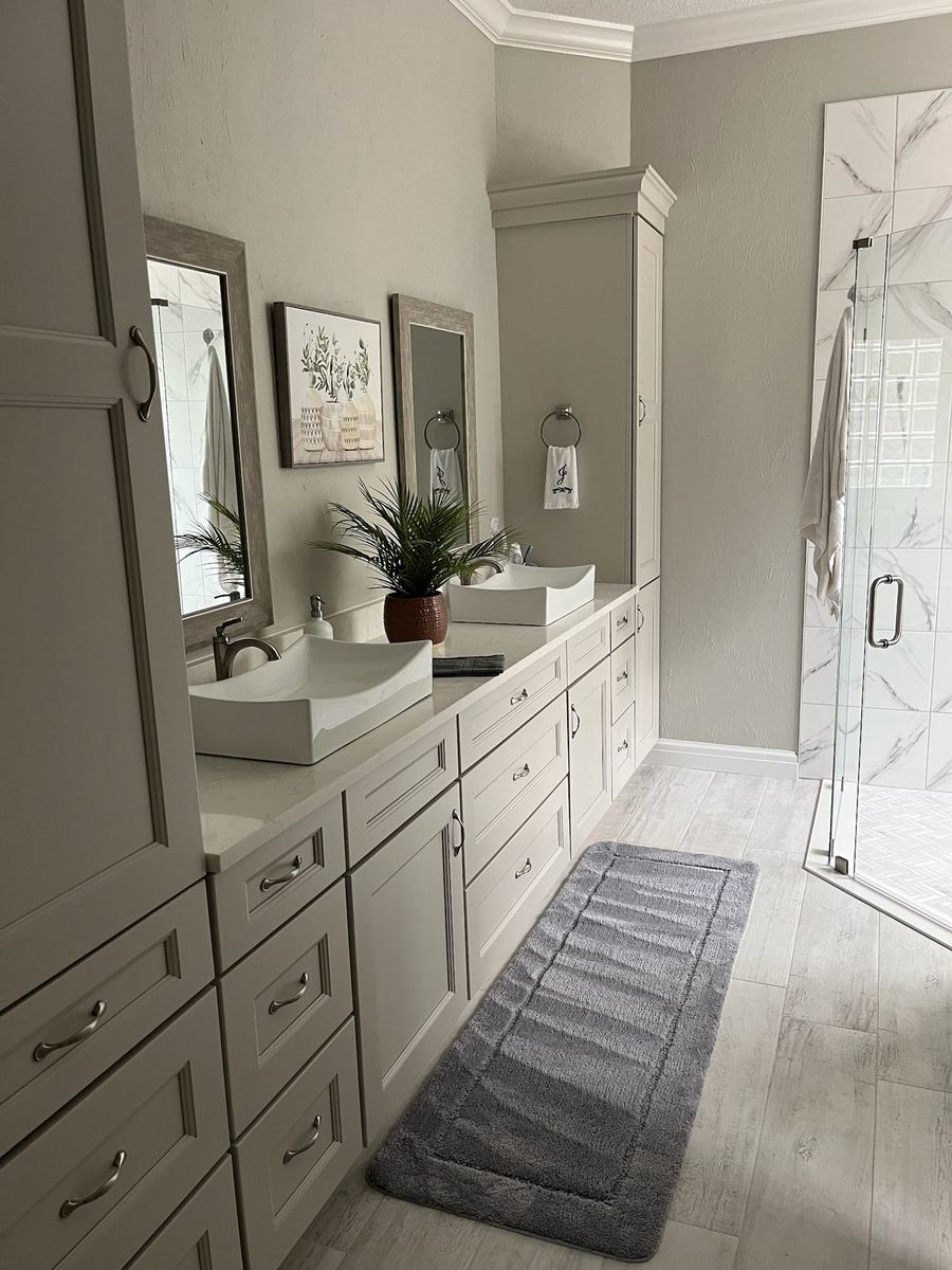 Full master bathroom remodel with wood-look floor tile and marble-look shower, Flagler County FL