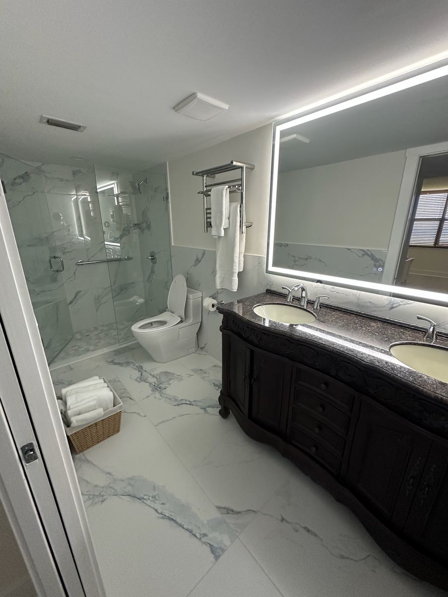 Master bathroom remodel with Ditra Heat Floors, large format tile, Full Schluter System, St. Augustine FL