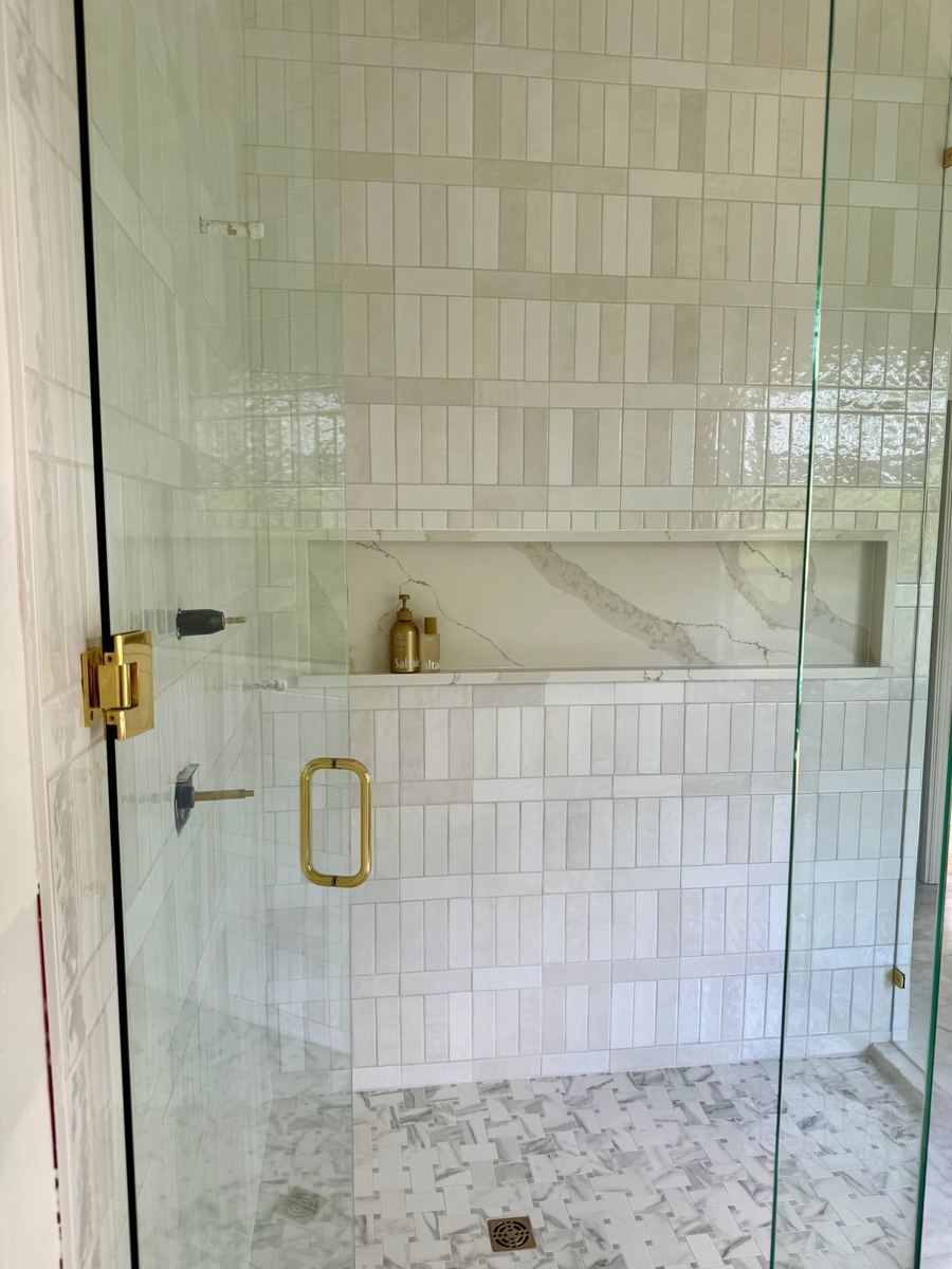 Large shower remodel, soldier-course chic tile installation with gold trim, St. Augustine FL